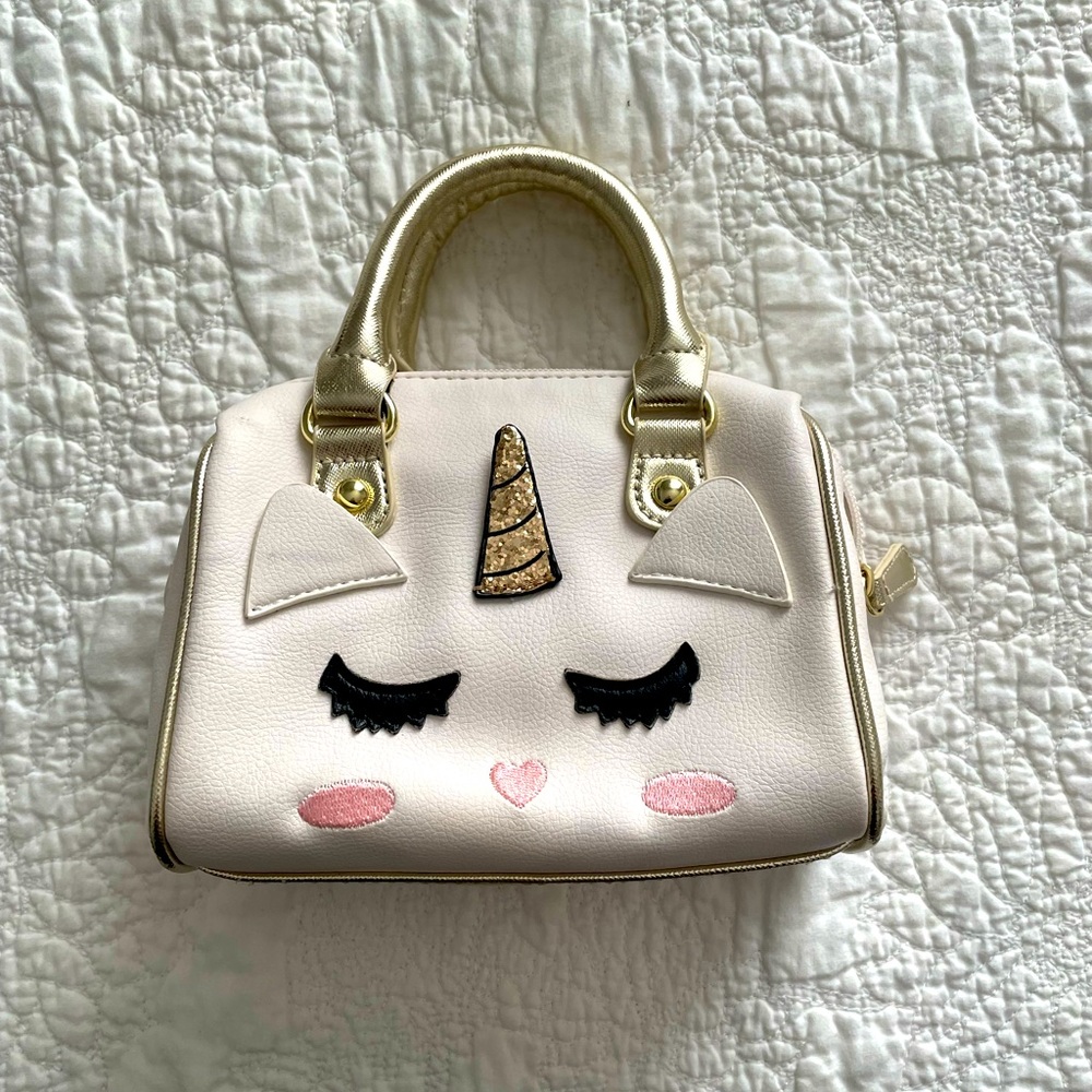 Betsey Johnson: Unicorn hand bag.